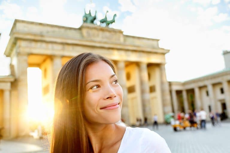 Berlin People Woman At Brandenburg Gate
